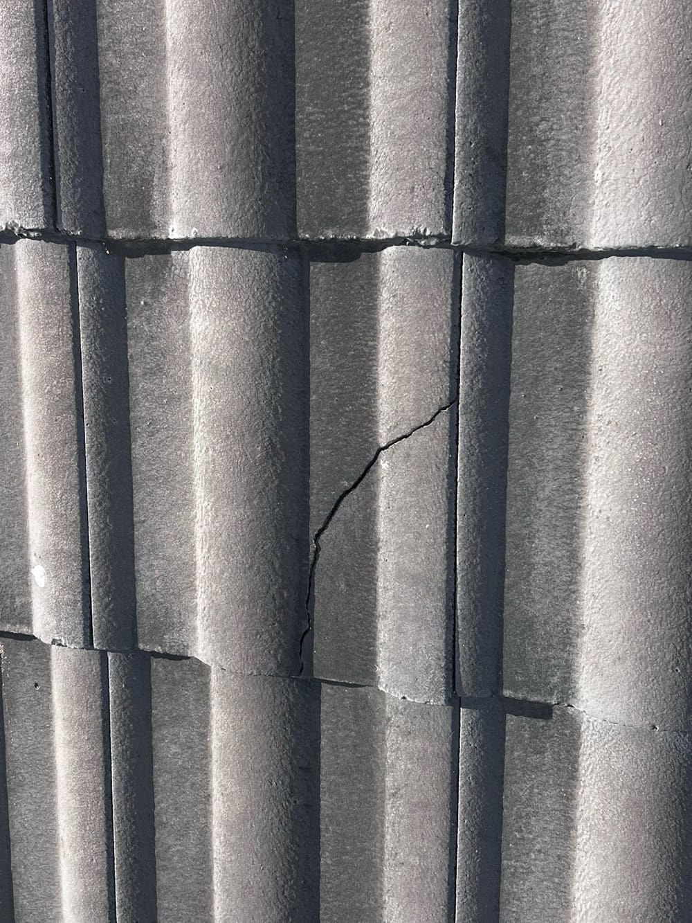 Tiles cracked/broken, recorded during a pre-purchase inspection in Banyo